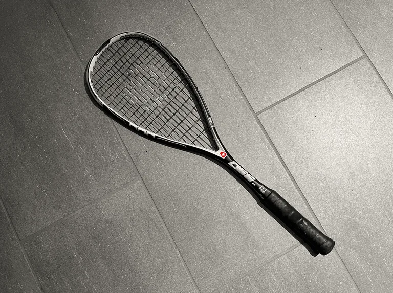Raquette de squash Artengo noire pour adulte - Confort et précision